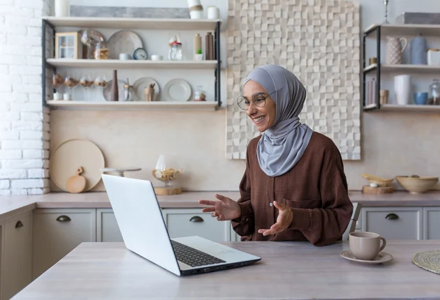 young-beautiful-muslim-woman-in-hijab-using-laptop-2022-09-28-23-19-44-utc